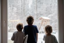 kids looking at snow