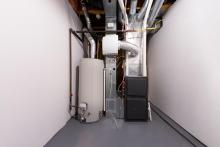 Boiler and furnace in residential home basement