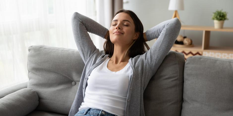 Woman enjoying her air purifier inside