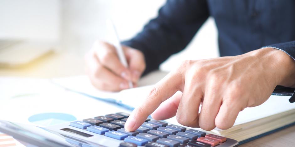 Man using calculator