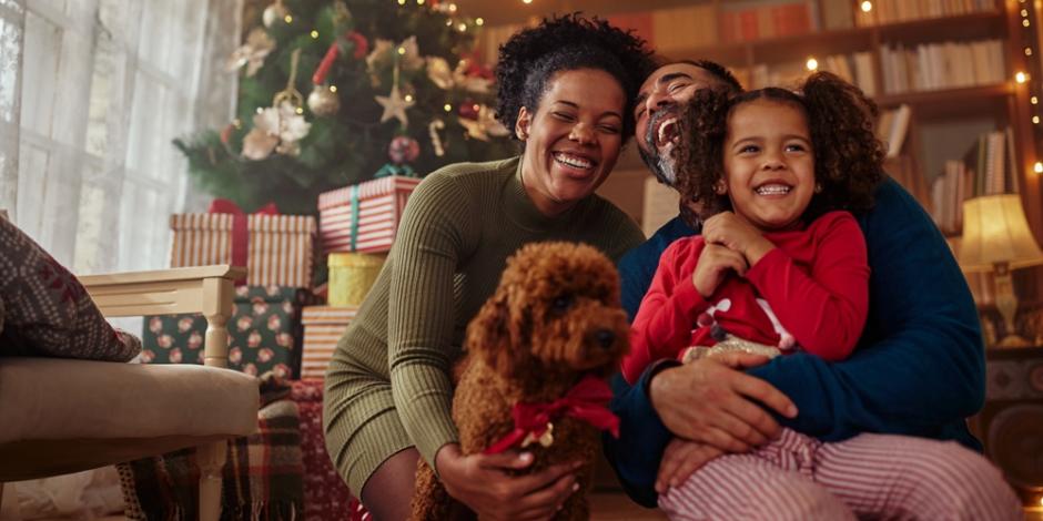 Happy family having fun at home at christmas time